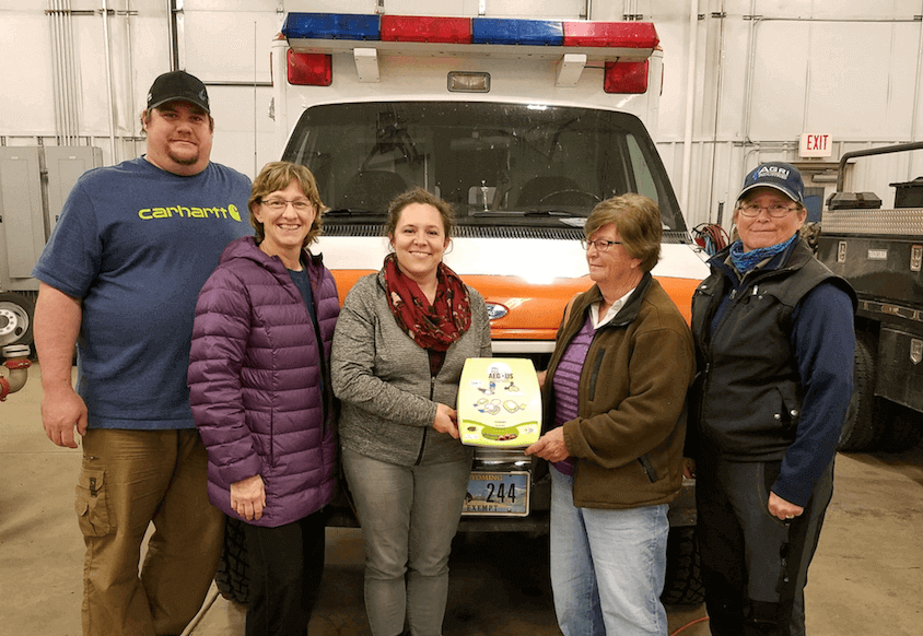 Mike Buss and other Clearmont Fire District staff, AED.us giveaway winners