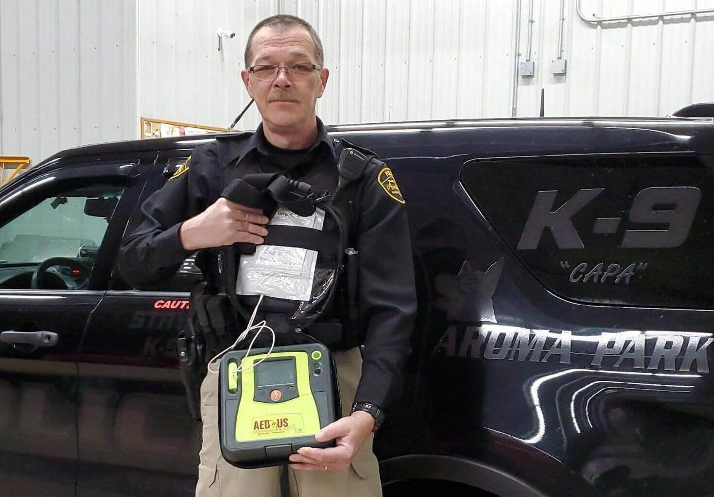 Todd Navratil of Aroma Park Police Department, AED.us giveaway winners