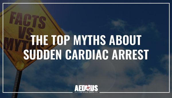 Yellow sign that says "Facts vs Myths" with a blue sky. White letters showing The Top Myths about Sudden Cardiac Arrest.